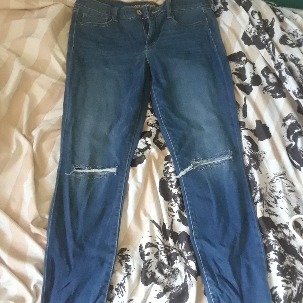 Ripped Knee Jeans